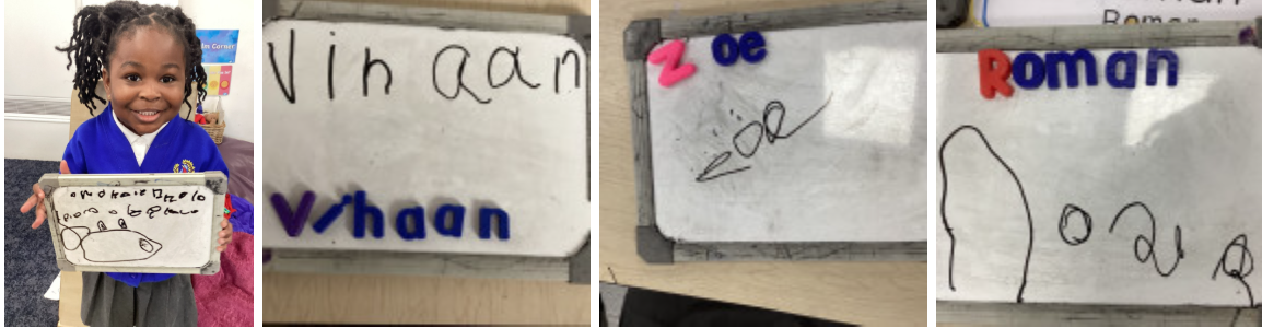 Students showing their work on whiteboards writing their names