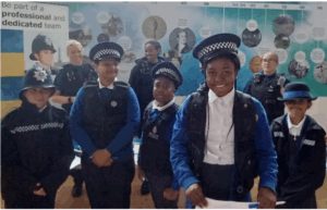 Students dressed in police gear