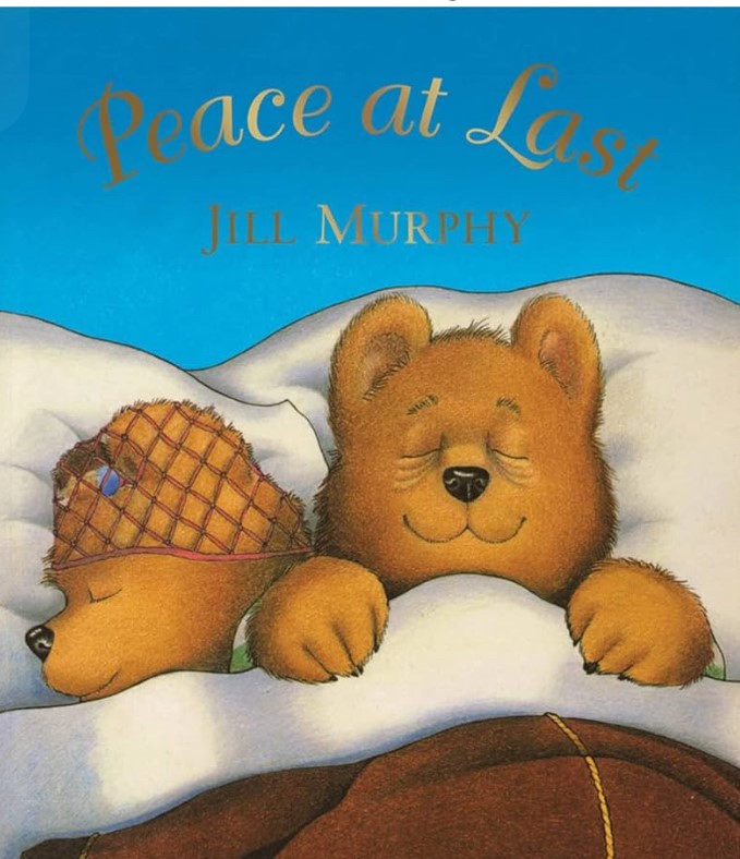 This is the cover of the children's book "Peace at Last" by Jill Murphy. The book features Mr. and Mrs. Bear trying to find a quiet place to sleep. This suggests the children may have been read this book, or the theme of the book (sleep, quiet, noise) is being tied into their activities.
